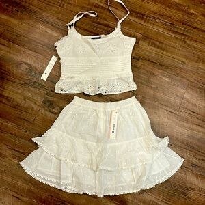 White two piece set from AQUA. Top and bottom size xs